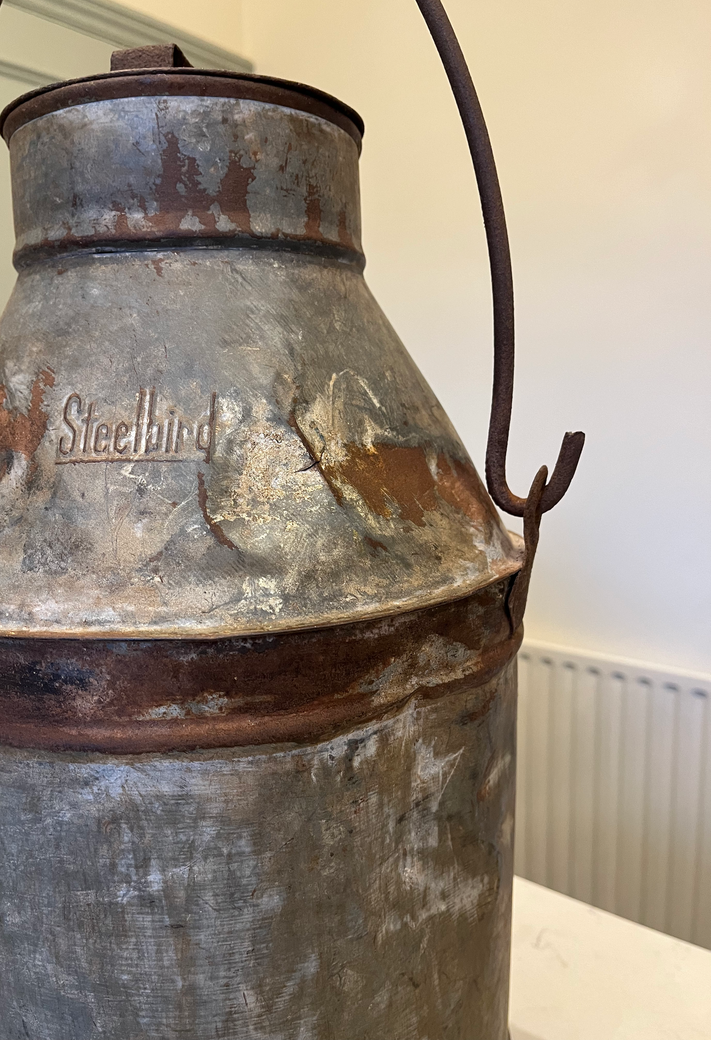 Large distressed metal milk churn