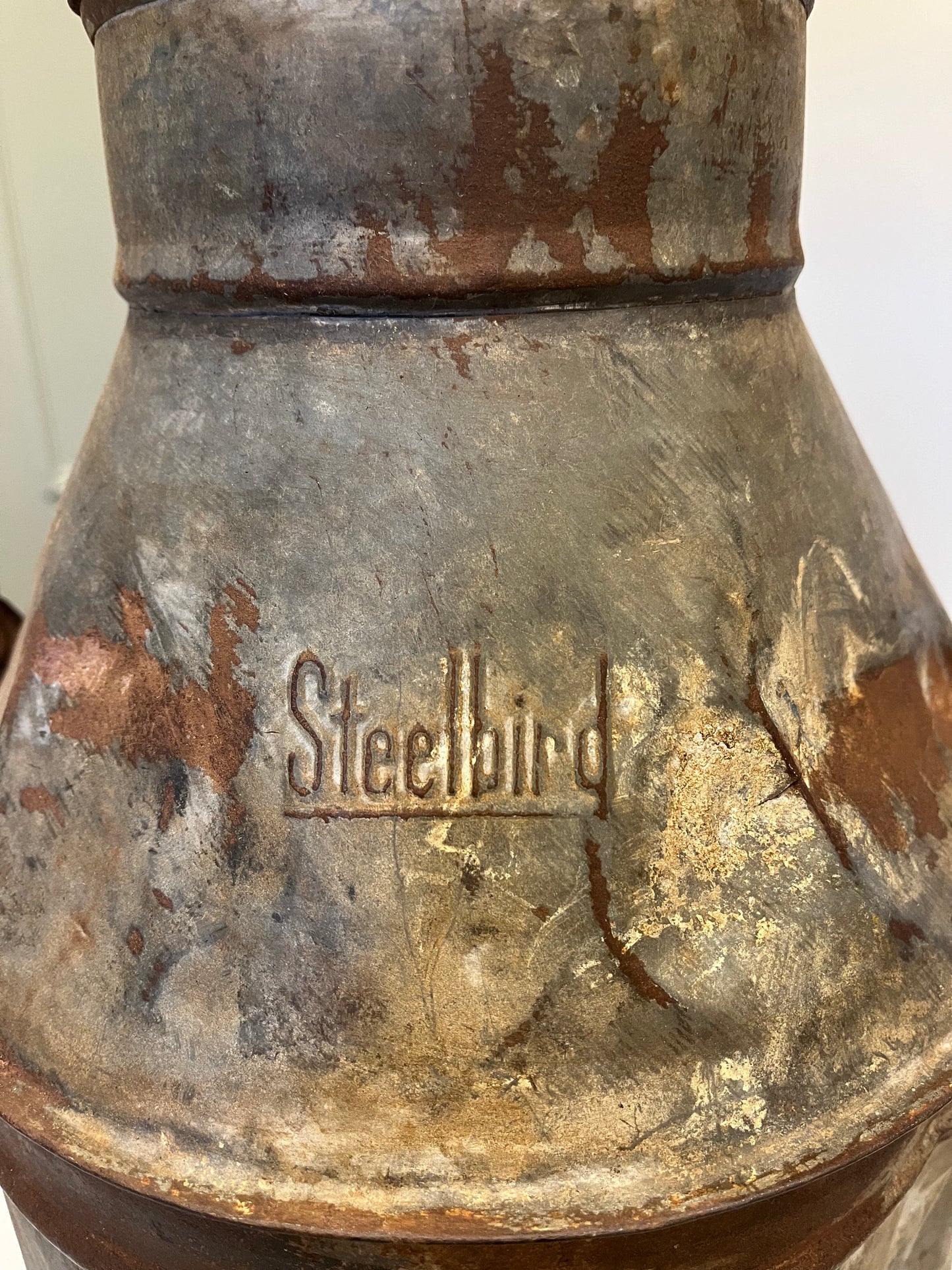 Large distressed metal milk churn